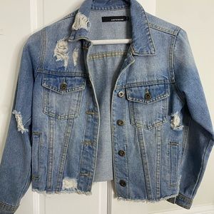 Cool distressed girls Contraband denim jacket.